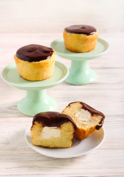 Cream Filling Cakes Chocolate Glaze Wooden Table — Stock Photo, Image