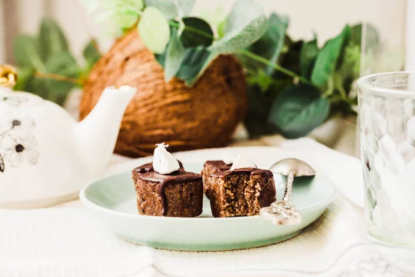 Raw chocolate candy with nuts and coconut, healthy vegan dessert — Stock Photo, Image