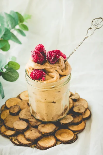 Healthy chocolate banana ice cream, raspberries.Toning. — Stock Photo, Image