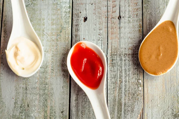 Set of tree classic sauce - ketchup, mayonnaise and mustard on b — Stock Photo, Image