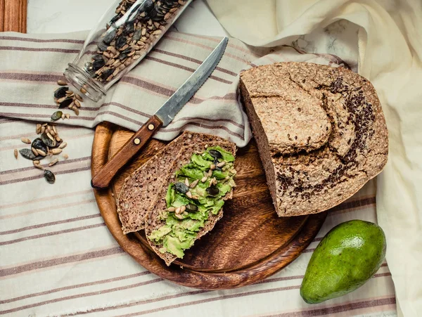 Avocado toast on gluten-free bread, rustic background. Guacamole — Stock Photo, Image