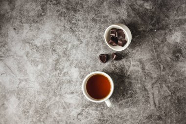 Valentine's day Chocolate Hearts on gray background. Dark Chocol