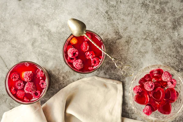 Berries in jelly pudding with fresh raspberries in glasses. Vale — Stok fotoğraf