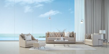 Lüks sahil evi. Sofa, koltuk, tabure, yan masa, lambalar, lambalar, oturma odasında sonsuz kenar yüzme havuzu ve deniz manzaralı perdeler. Tatil evi ya da tatil haini.
