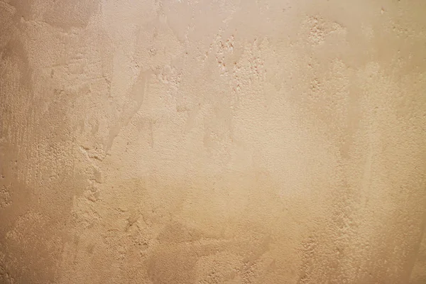 Textura marrón de un muro de hormigón con pequeñas irregularidades —  Fotos de Stock