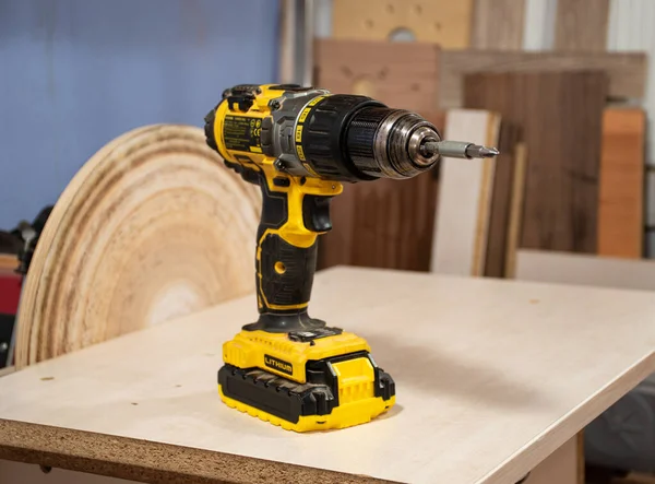 hand drill power tools on the bench of sanding machine
