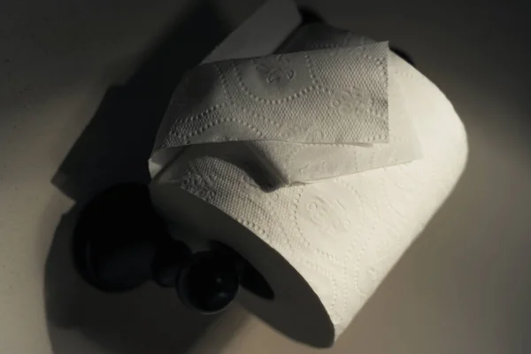 Dramatic Close up of toilet paper supply — Stock Photo, Image
