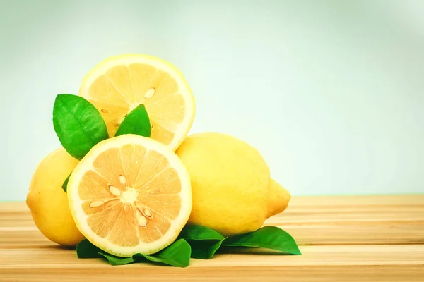 Fresh lemons gruop on wooden table — Stock Photo, Image