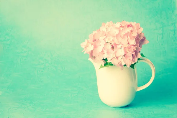 Sweet  hydrangea flowers in white vase , sweet pastel color — Stock Photo, Image