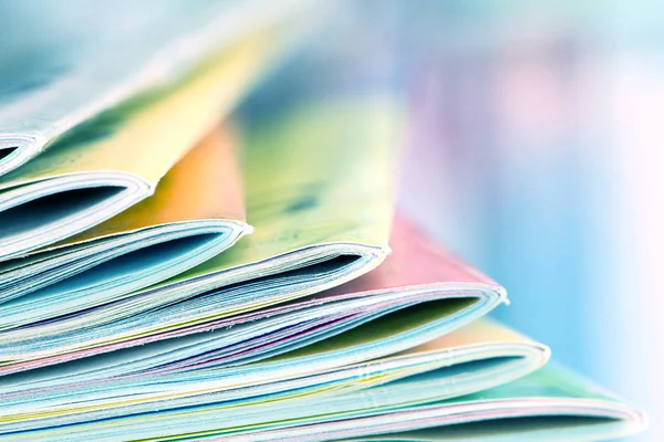 Close up edge of colorful magazine stacking — Stock Photo, Image