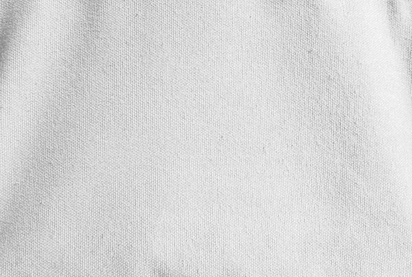 Stäng upp vit canvas tyg bakgrund — Stockfoto