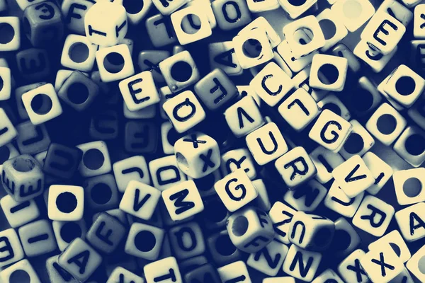 Black and white of English alphabet cube as background — Stock Photo, Image