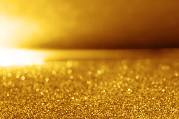 Abstract gold glitter lighting background — Stock Photo, Image