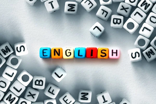 Colorful english word cube on white paper background ,English la — Stock Photo, Image