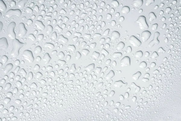 A gota de água abstrata na superfície de fundo branco fresco — Fotografia de Stock