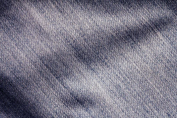 Feche a superfície de jeans azul jeans com backgro de textura de onda — Fotografia de Stock