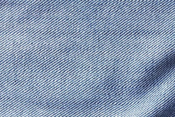 Feche a superfície de jeans azul denim com fundo de textura de onda — Fotografia de Stock