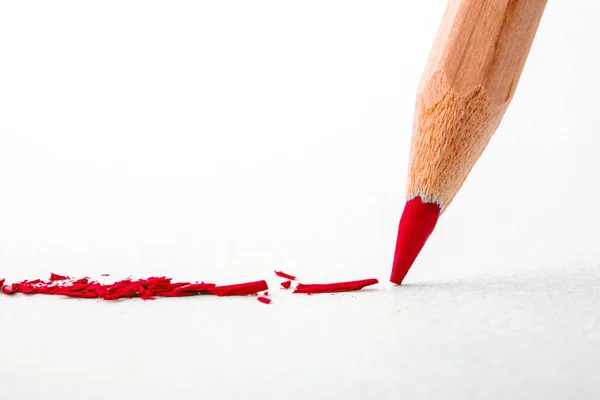 Zblízka hlavou červená barva tužka na kreslení papíře, cre — Stock fotografie