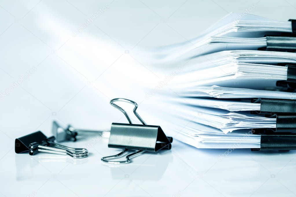 extreamly close up the  stacking of office working document with