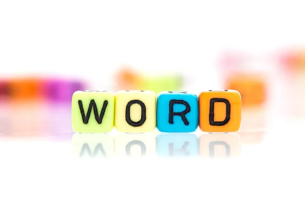 Colorful word cube of  WORD on a white background — Stock Photo, Image