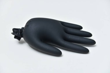 Siyah eldiven. Coronavirus konsepti. Yalnız siyah eldiven.