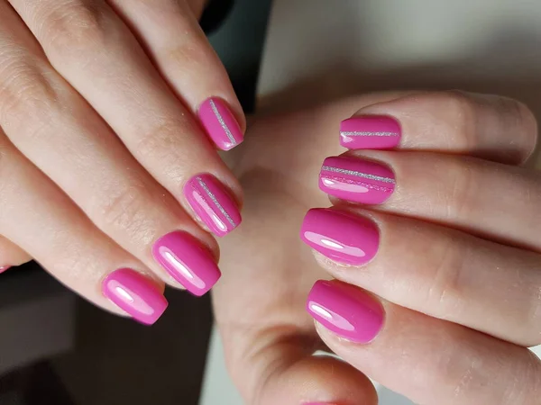 Beautiful woman\'s nails with beautiful manicures.