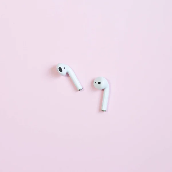 Bluetooth Wireless Earphones Isolated Pink Background — Stock Photo, Image