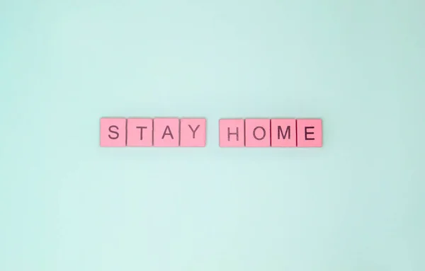 Words Stay Home Made Pink Wooden Letters Light Turquoise Background — Stock Photo, Image