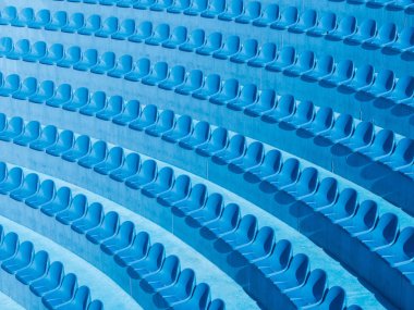Spor geometrik desen. Plastik koltukların yarı dairesel sıraları. Mavi trend tasarımcı arkaplanı