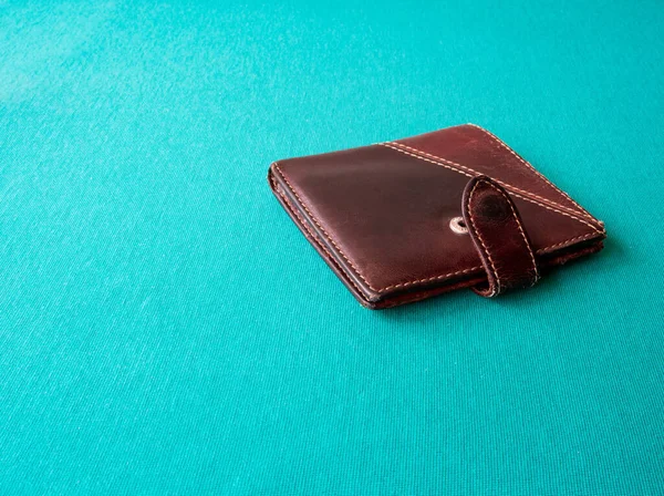 Empty wallet with no money in the background.Bankruptcy is an empty wallet.It is not possible to repay the loan and mortgage.Old and empty brown wallet