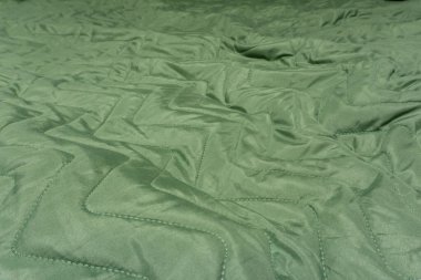 Kanepe için buruşuk yeşil battaniye 