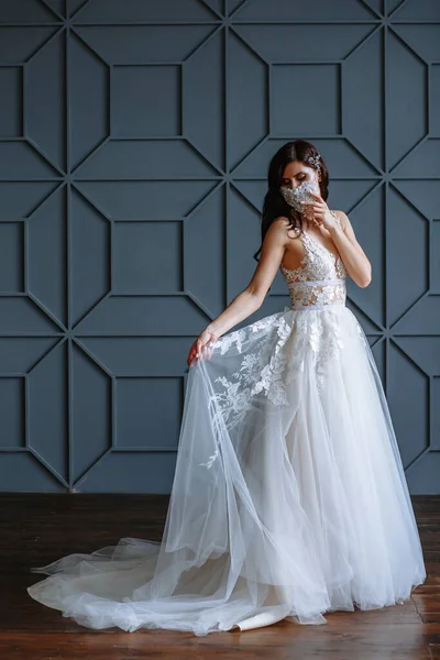 Bride in with a handmade wedding antiviral mask on her face