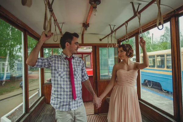 Guy Girl 60S Clothes Hold Hands While Standing Old Tram — Stock Photo, Image