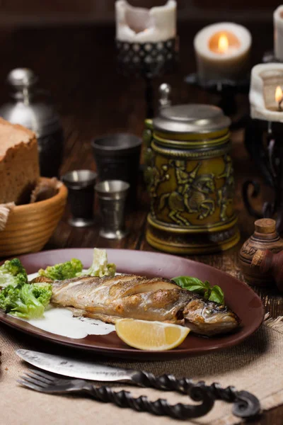 Grilled mackerel with sauce and broccoli — Stock Photo, Image