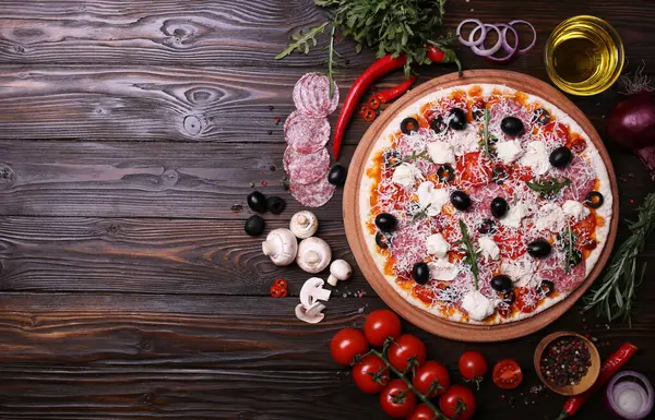 Italian pizza with the best products, with tomatoes, mozzarella cheese, mushrooms and olives