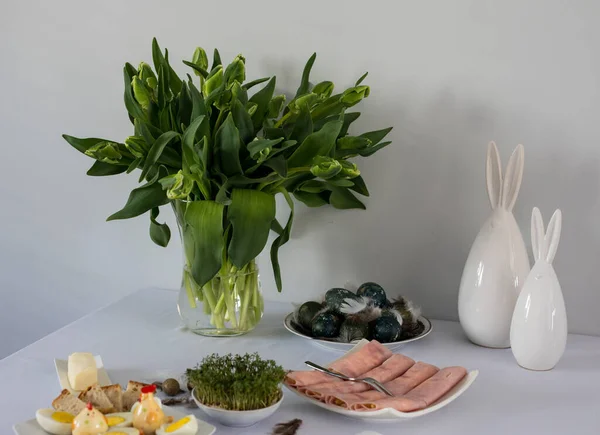 traditional, polish Easter table with colored eggs, boiled eggs