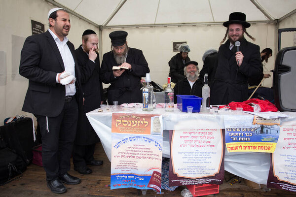 Lezajsk, Poland - 01 March 2016: Hassidic orthodox jews arriving from Europe, USA, Canada and Israel to celebrate and pray during Hasidic holiday of the 231 anniversary of tzadik  Elimelech death