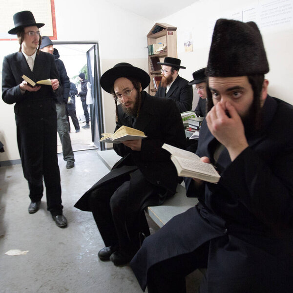 Lezajsk, Poland - 01 March 2016: Hassidic orthodox jews arriving from Europe, USA, Canada and Israel to celebrate and pray during Hasidic holiday of the 231 anniversary of tzadik  Elimelech death