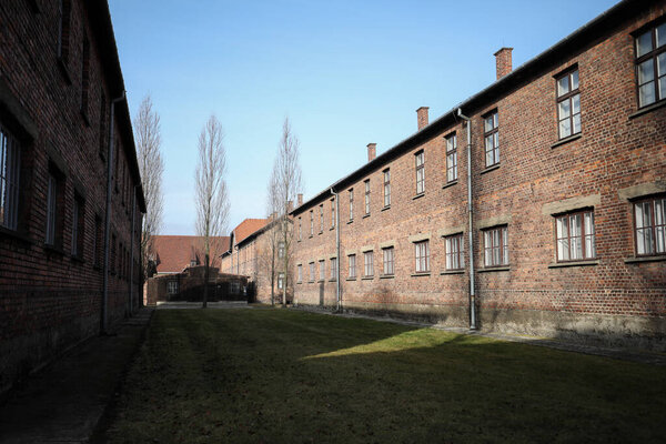 Auschwitz, Oswiecim, Poland - 27 January 2020: camp street in Auschwitz, brick buildings of Auschwitz I