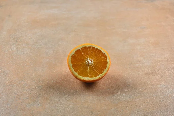 orange fruit on stone background