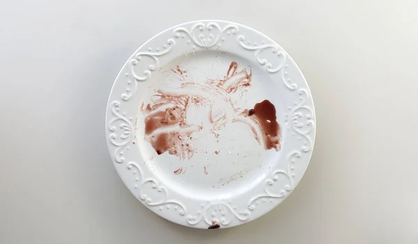Empty White Dish With Food Waste