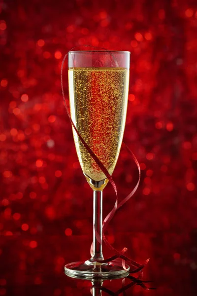 Champagne en Kerstmis lights. — Stockfoto