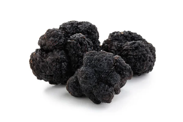 Trufas negras sobre blanco . — Foto de Stock