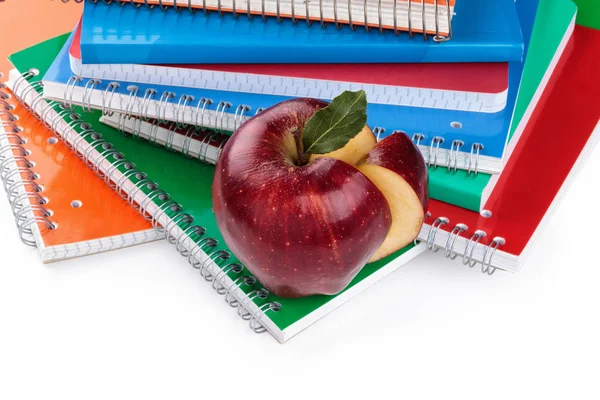 Notebooks and red apple. — Stock Photo, Image