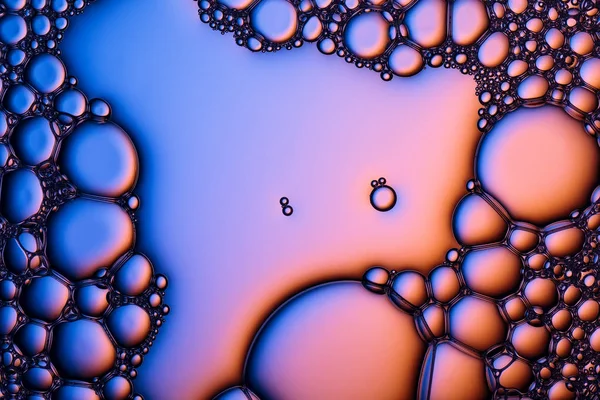 Closeup shot of foam bubbles from soap or shampoo washing.