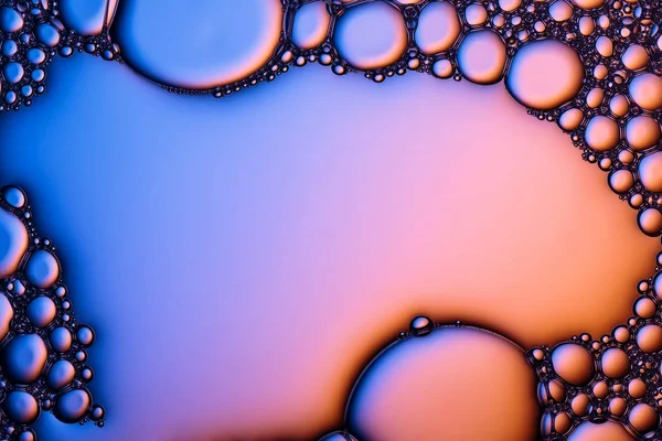 Closeup shot of foam bubbles from soap or shampoo washing.