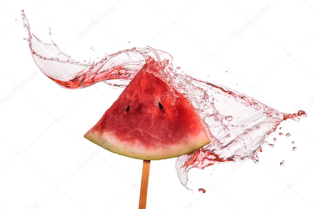 Slice of watermelon with splash of pink juice.