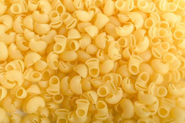 Heap Van Gedroogde Cornetti Rigati Italiaanse Pasta Geïsoleerd Een Witte — Stockfoto