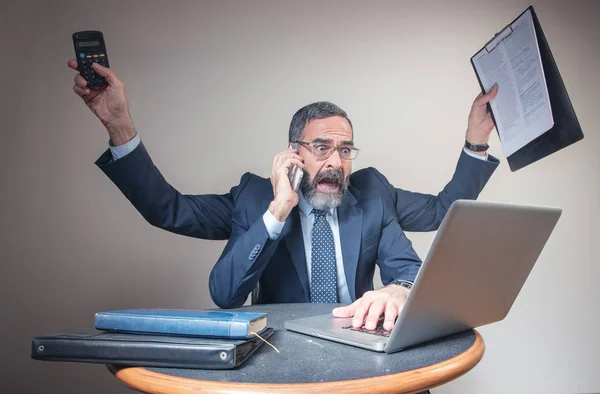 Pressured businessman multitasking, business concept and urban lifestyle — Stock Photo, Image