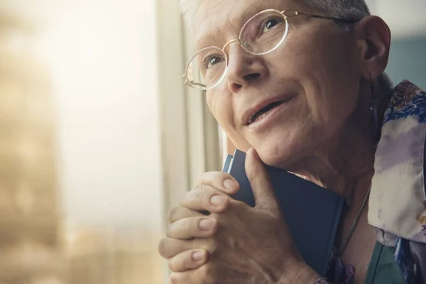 Nostalgic and melancholic old lady — Stock Photo, Image